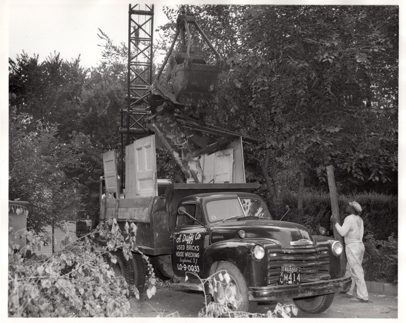 1 black and white photograph 8 x 10 Public Works Department tearing down home undated 2.jpg