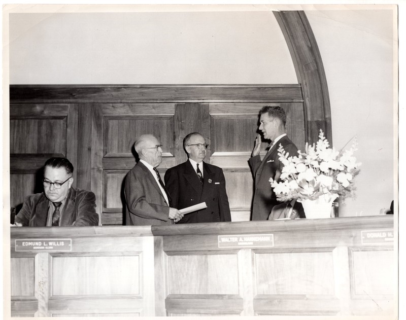 1 black and white photograph 8x10 Mayor and Council swearing in pictured Mayor Edward Meyer and three public officials undated.jpg