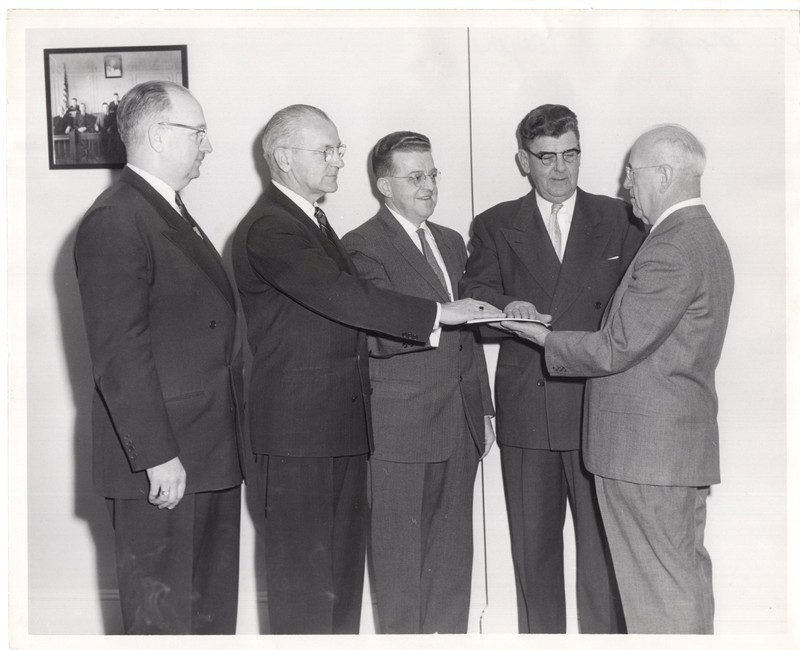 1 black and white photograph 8x10 Mayor Edward Meyer swearing in with four unidentified subjects undated.jpg