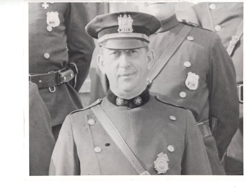 1 black and white photograph 8 x 10 Police Chief Scott D Coombs undated.jpg