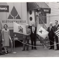 1 black and white photograph 7 people outside History Mobile 1960s