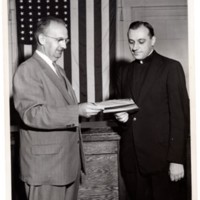 1 black and white photograph 8x10 of Mayor Edward Meyer and unidentified priest undated.jpg